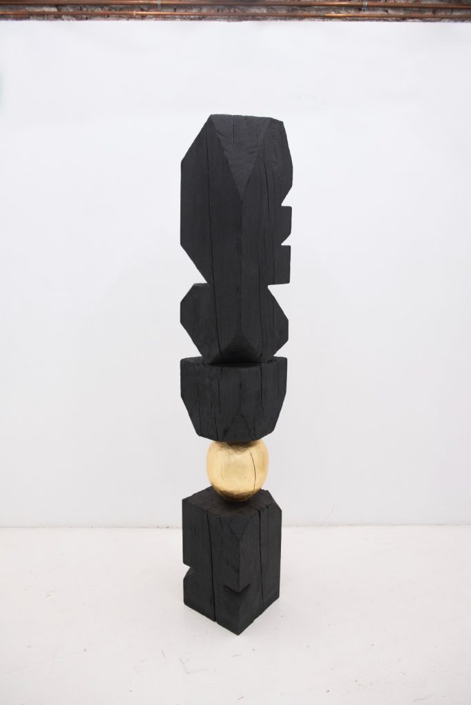 Column, 2023<br>
burnt wood and gold leaf<br>
78.74 x 11.81 x 11.81 inches (200 x 30 x 30 cm)<br>SOLD